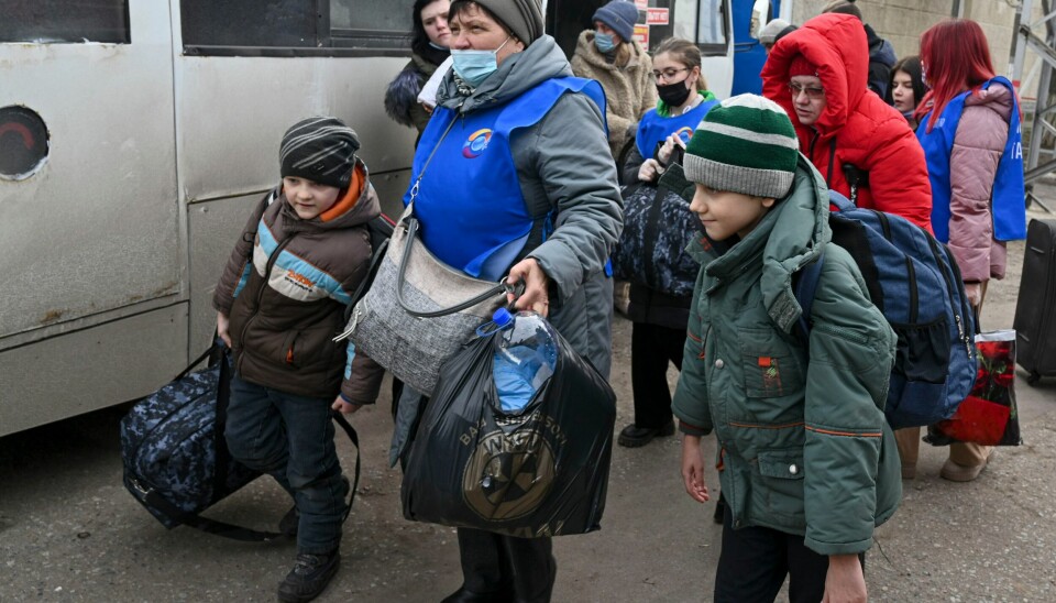 KONFLIKT: Innbyggere i regionene Donetsk og Luhansk blir evakuert fra områder kontrollert av prorussiske separatister. Nå melder Kreml at separatistlederne har bedt om russisk militærhjelp. Innbyggere i regionene Donetsk og Luhansk blir evakuert fra områder kontrollert av prorussiske separatister. Nå melder Kreml at separatistlederne har bedt om russisk militærhjelp. Foto: AP / NTB