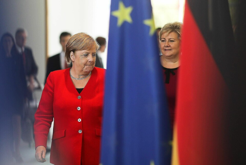German Chancellor Angela Merkel, left, and the Prime Minister of Norway Erna Solberg, right, arrive for a news conference, after a meeting at the chancellery in Berlin, Tuesday, Oct. 15, 2019. (Photo/Markus Schreiber)