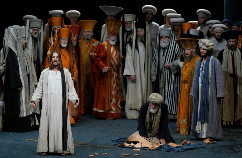 FILE - In this May 10, 2010 file photo Frederik Mayet as Jesus, left, performs with laymen during a dress rehearsal of the passion plays 2010 in the theatre of Oberammergau, southern Germany. More than 2,000 citizens of this Bavarian village participate in the century-old play of the suffering of Christ, staged every ten years and dating back to 1634. (AP Photo/Matthias Schrader, File)