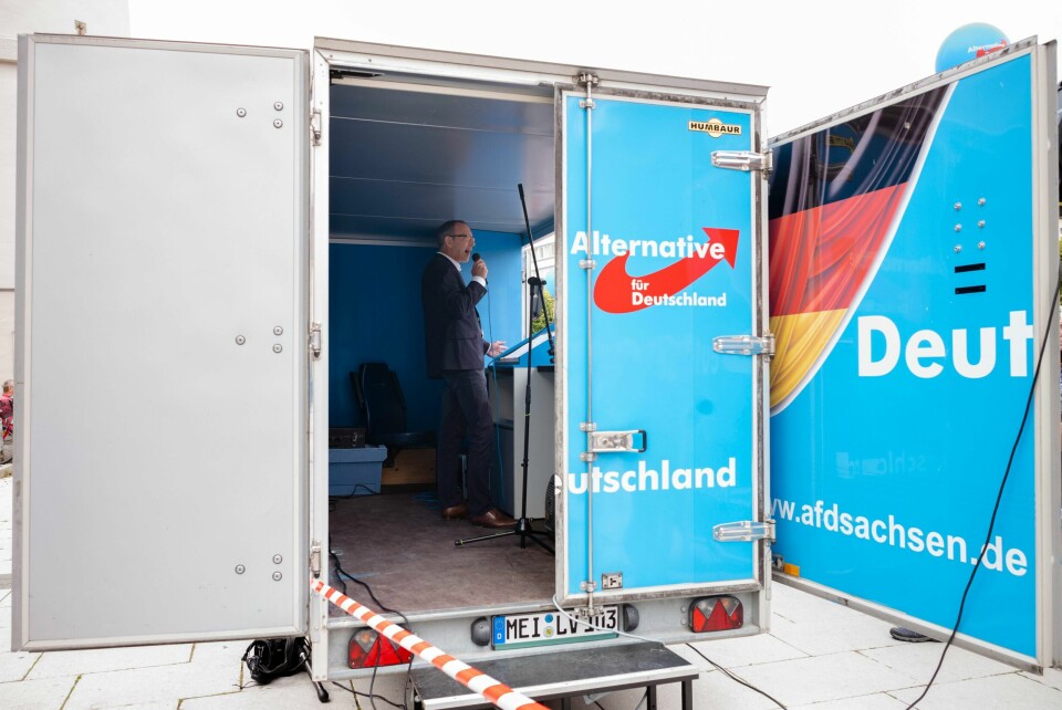 In this Thursday, Aug. 15, 2019 photo, Joerg Urban, top AfD candidate for the Saxony state elections, speaks on an election campaign rally of German Alternative for Germany, AfD, party in Bautzen, Germany. Two elections in eastern Germany's states Brandenburg and Saxony on Sept. 1, 2019, look set to bring big gains for the far-right Alternative for Germany party and another blow to the traditional parties that form the national government. (AP Photo/Markus Schreiber)