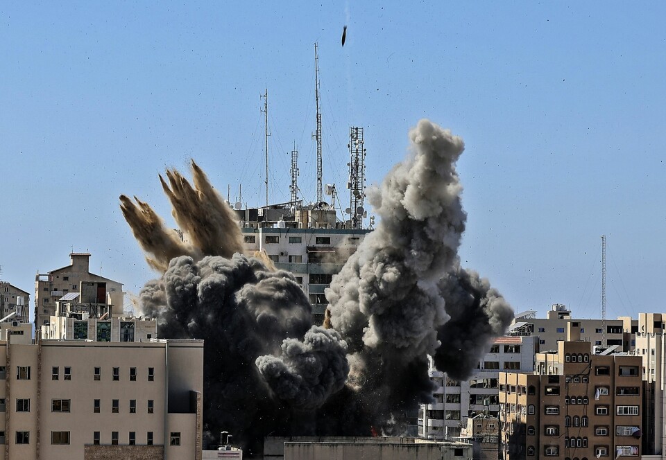 BOMBET: Mediebygning i Gaza by ble forrige helg bombet av IDF: Lørdag bombet Israel et høyhus i Gaza by. Ingen ble drept eller såret i angrepet, men siden 10. mai er 219 palestinere blitt drept, ifølge tall onsdag. Tolv er drept på israelsk side. Foto: Mahmud Hams / pool via AP / NTB
