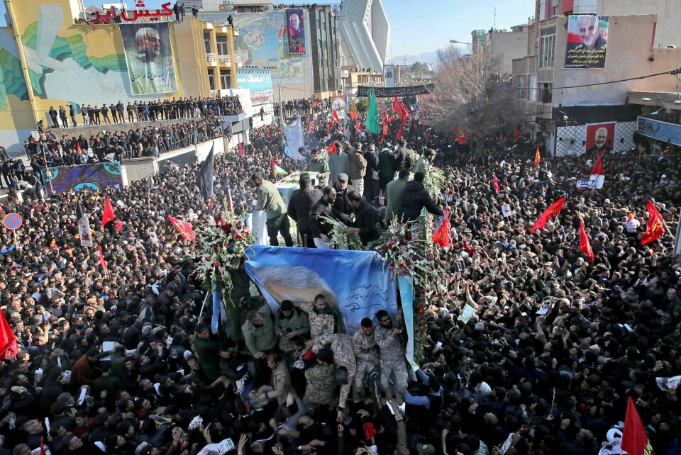 Coffins of Gen. Qassem Soleimani and others who were killed in Iraq by a U.S. drone strike, are carried on a truck surrounded by mourners during a funeral procession, in the city of Kerman, Iran, Tuesday, Jan. 7, 2020. The leader of Iran's Revolutionary Guard threatened on Tuesday to 'set ablaze' places supported by the United States over the killing of a top Iranian general in a U.S. airstrike last week, sparking cries from the crowd of supporters of 'Death to Israel!' (Erfan Kouchari/Tasnim News Agency via AP)
