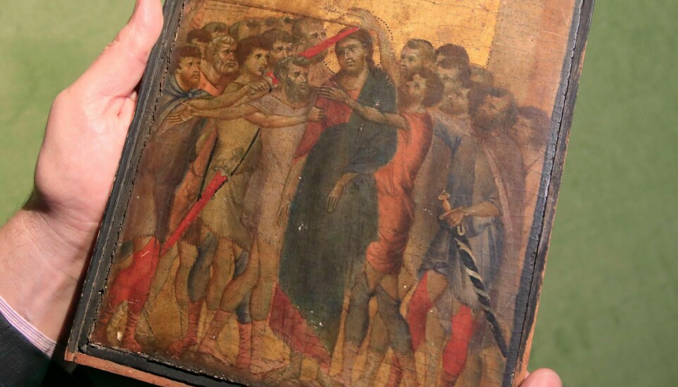 Et maleri fra 1200-tallet av den italienske kunstneren Cimabue er solgt på auksjon for 240 millioner kroner. Maleriet ble oppdaget i et fransk kjøkken. Foto: Michel Euler / AP / NTB scanpix