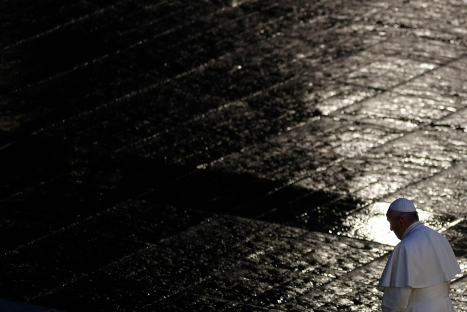 Pope Francis walks during Urbi and Orbi prayer (Latin for To the City and To the World) in an empty St. Peter's Square, at the Vatican, Friday, March 27, 2020. Praying in a desolately empty St. Peter's Square, Pope Francis on Friday likened the coronavirus pandemic to a storm laying bare illusions that people can be self-sufficient and instead finds all of us fragile and disoriented and needing each other's help and comfort. The new coronavirus causes mild or moderate symptoms for most people, but for some, especially older adults and people with existing health problems, it can cause more severe illness or death. (Yara Nardi/Pool Photo via AP)