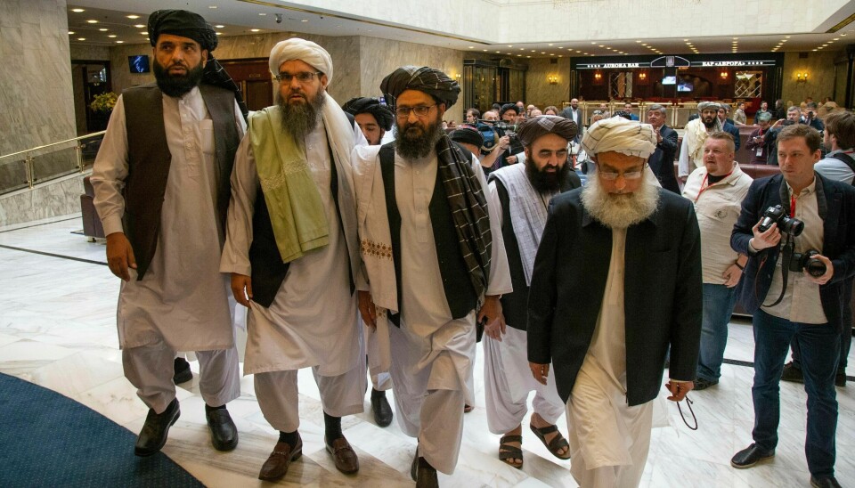 Mulla Abdul Ghani Baradar er Talibans politiske toppleder (tredje fra venstre). Her sammen med andre medlemmer under en møte i Russland.