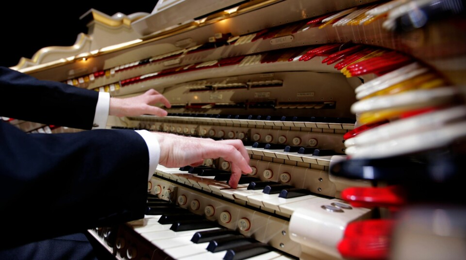 Organist Richard Hill plays a newly restored 1903's American Wurlitzer Theatre Pipe Organ, which is believed to be the largest in Europe, at the Troxy entertainment venue in London, Wednesday, July 29, 2015. The Wurlitzer holds over 1728 pipes ranging from 16 ft (4.9 meters) to 1 inch (2.5 cm) housed in four separate rooms, four keyboards, one pedal board and 241 stop keys, and has taken six years to restore. (AP Photo/Alastair Grant)