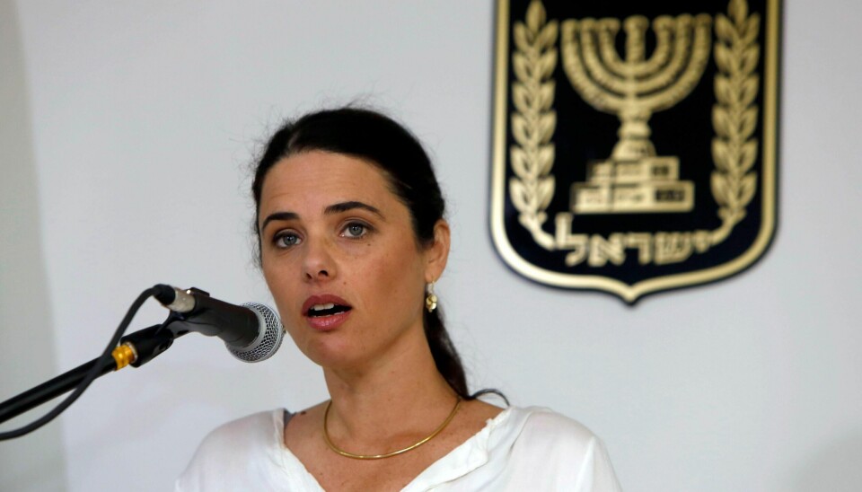 Israel's newly-appointed Justice Minister, Ayelet Shaked, 39, speaks during a ceremony welcoming her at the Justice Ministry, in Jerusalem, Sunday, May 17, 2015. Shaked has no legal experience and has been an outspoken critic of the country's judiciary, widely seen as a liberal bastion. She could influence appointment of judges and has championed bills that critics say are meant to stifle dovish groups. Shaked has toned down her rhetoric of late and complimented the country's supreme court justices. (AP Photo/Gali Tibbon, Pool)