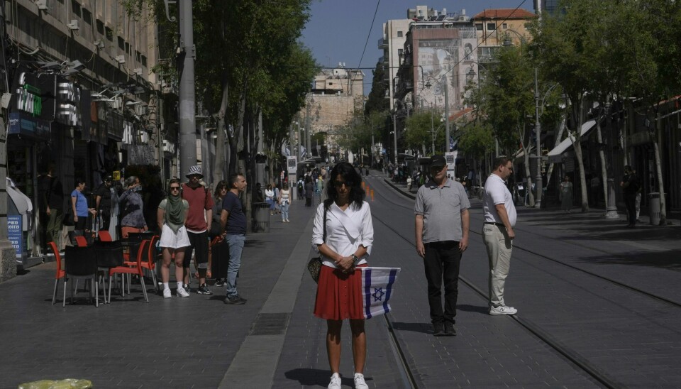 Folk står stille i to minutter i Jerusalem til minne om millioner av jøder som ble ofre for nazistenes masseutryddelse under annen verdenskrig. Foto: Mahmoud Illean / AP / NTB Folk står stille i to minutter i Jerusalem til minne om millioner av jøder som ble ofre for nazistenes masseutryddelse under annen verdenskrig. Foto: Mahmoud Illean / AP / NTB