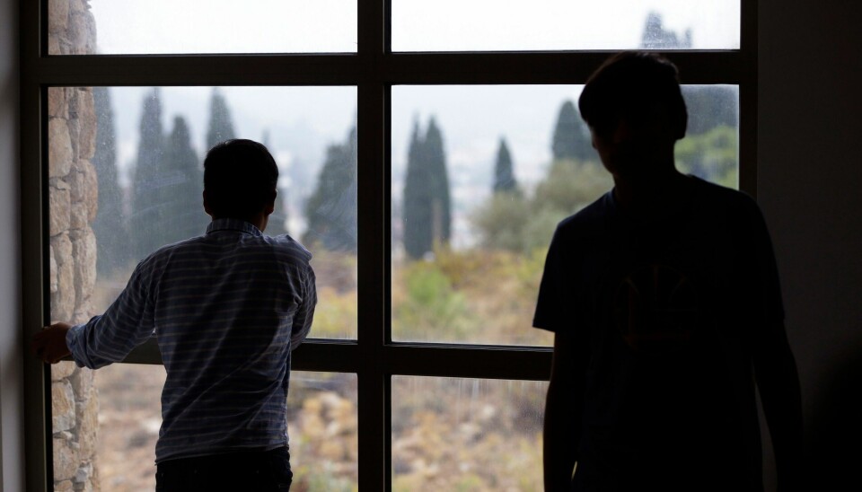 FORSVINNER: To barn på et senter for enslige mindreårige asylsøkere i Aten. Mer enn 18.000 migrantbarn har forsvunnet de siste årene. Greece Migrants