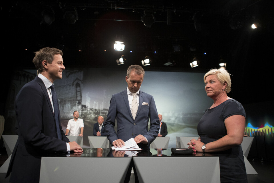 Knut Arild Hareide (KrF) og Siv Jensen (Frp) klare for verdidebatt under partilederdebatten i Arendal 14. august. Foto: Tor Erik Schrøder / NTB scanpix