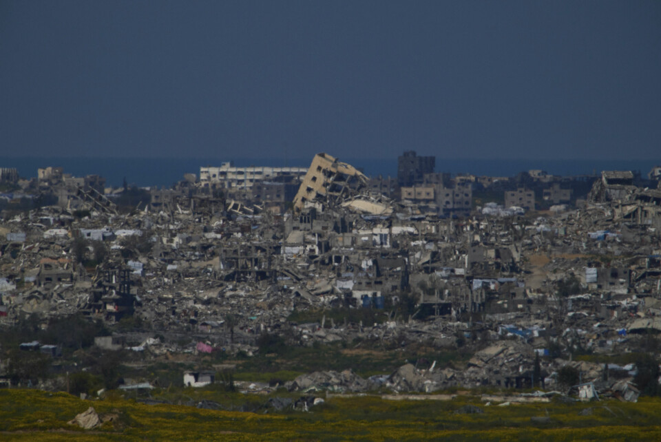 Ødelagte bygninger på Gazastripen sett fra sørlige Israel. Bildet ble tatt i dag, lørdag 23. mars. Foto: Leo Correa / AP / NTB Ødelagte bygninger på Gazastripen sett fra sørlige Israel. Bildet ble tatt i dag, lørdag 23. mars. Foto: Leo Correa / AP / NTB